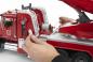 Preview: Bruder Spielfahrzeug Feuerwehr MACK Granite Feuerwehr mit Drehleiter, Wasserpritze, L+S Modul 02821