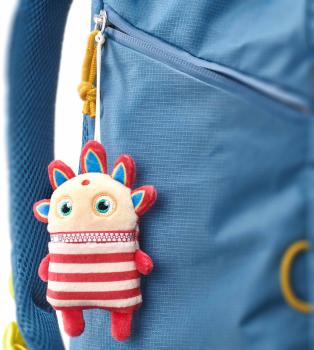 Preview: Schmidt Spiele Plüsch Stofftier Sorgenfresser Anhänger Nisha 10 cm 42670